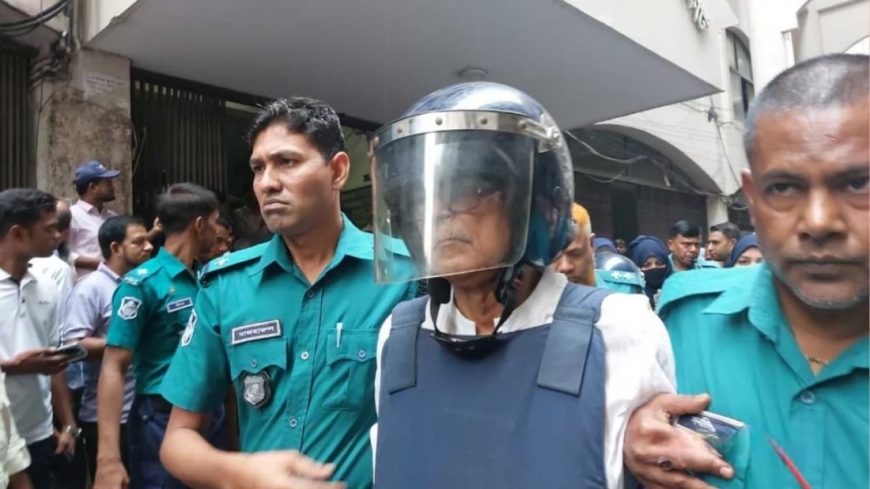 কাঠগড়ায় দাঁড়িয়ে হাসলেন মেনন